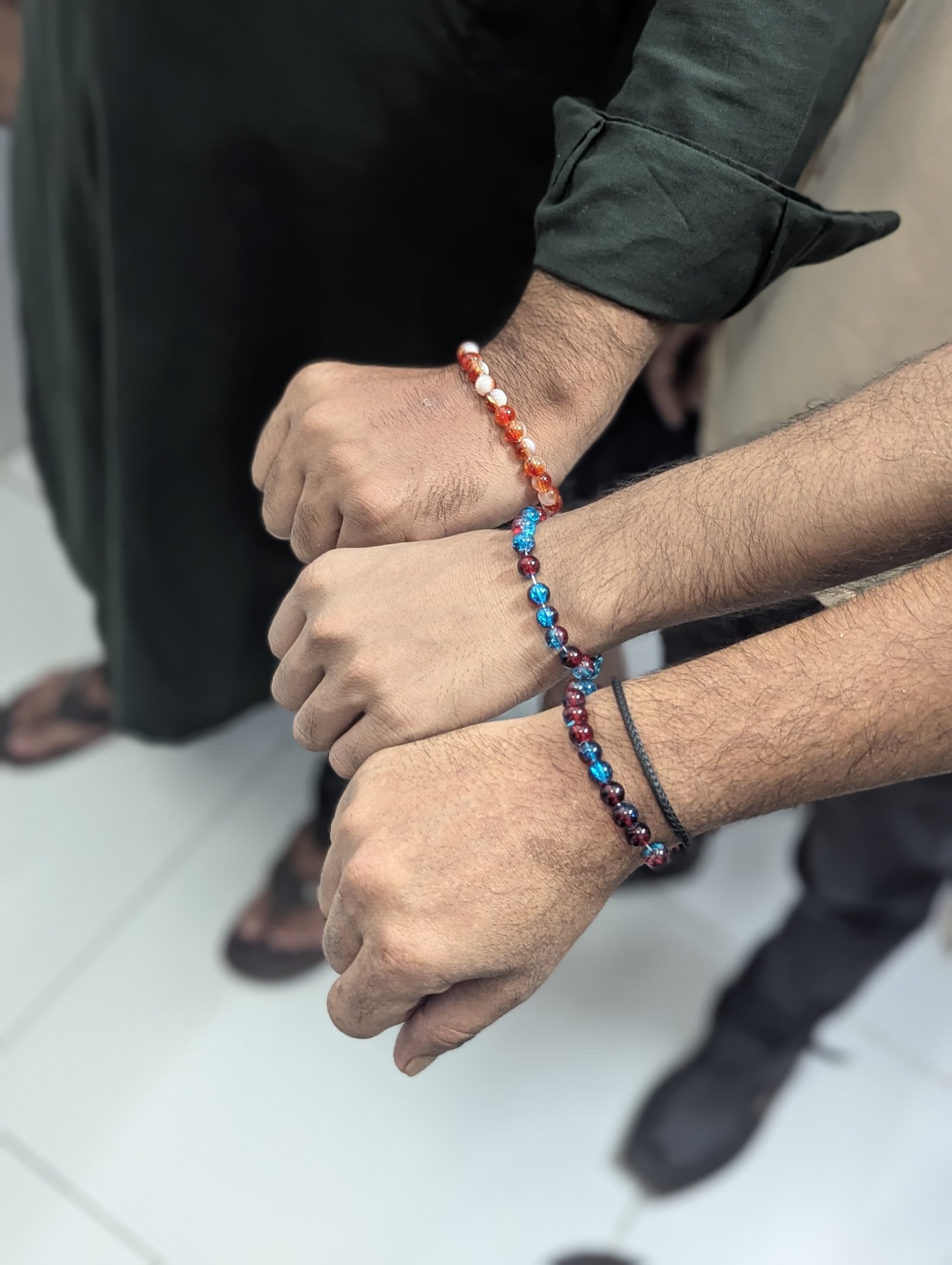 Occupational therapy bracelet-making session at IQ